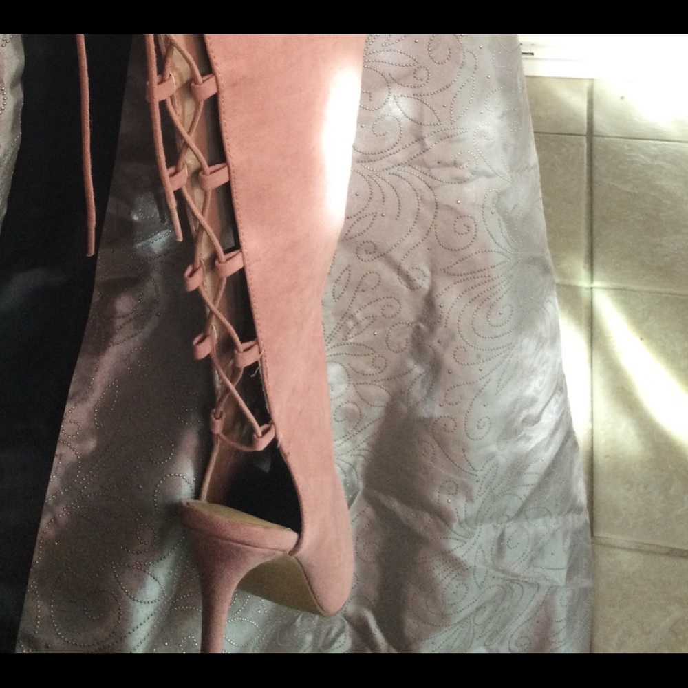 Pink suede thigh high boots with lace back